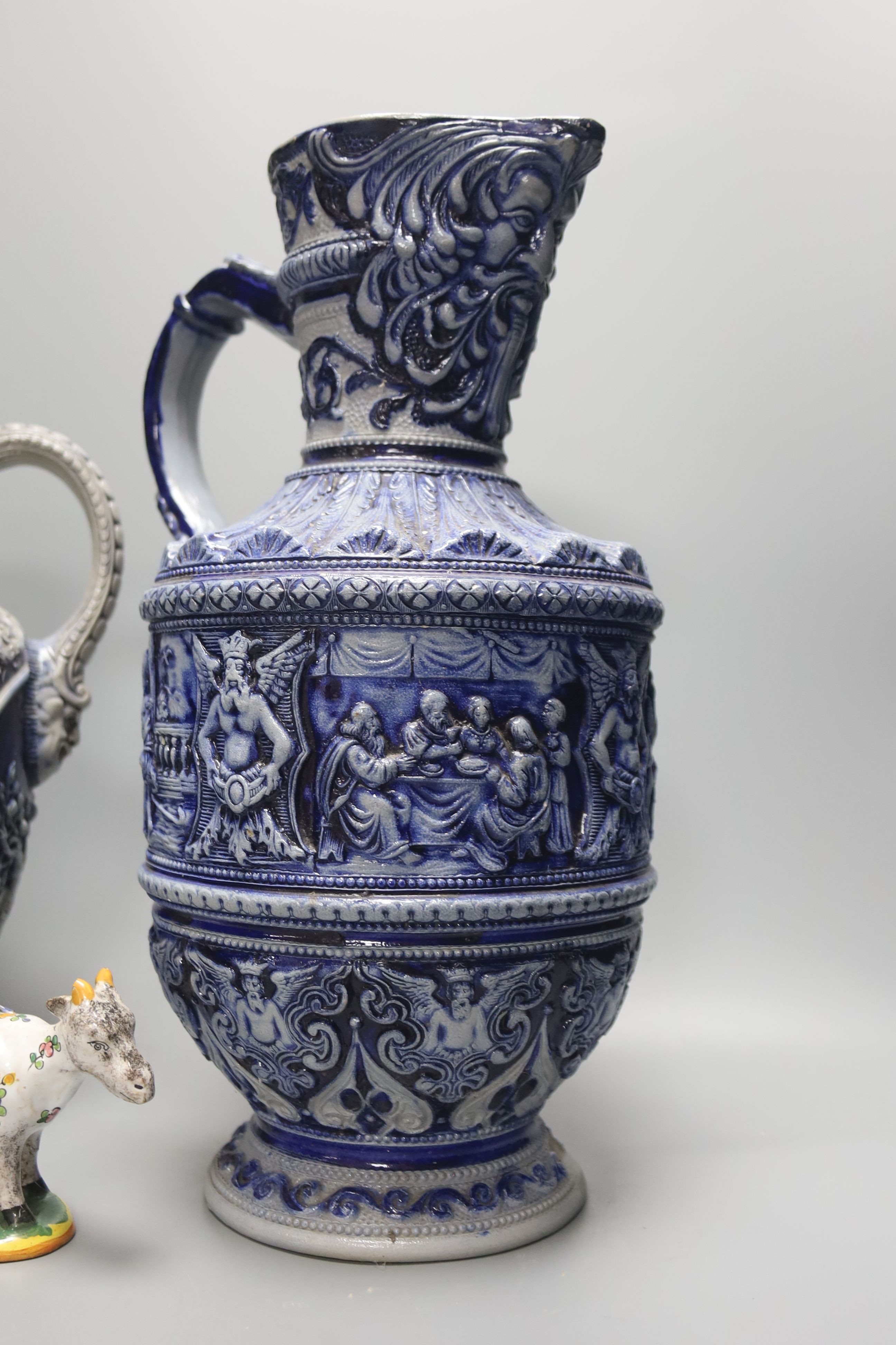 Two large German blue stoneware jugs 36cm